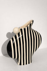 Black Striped Vessel With A Ball Handle