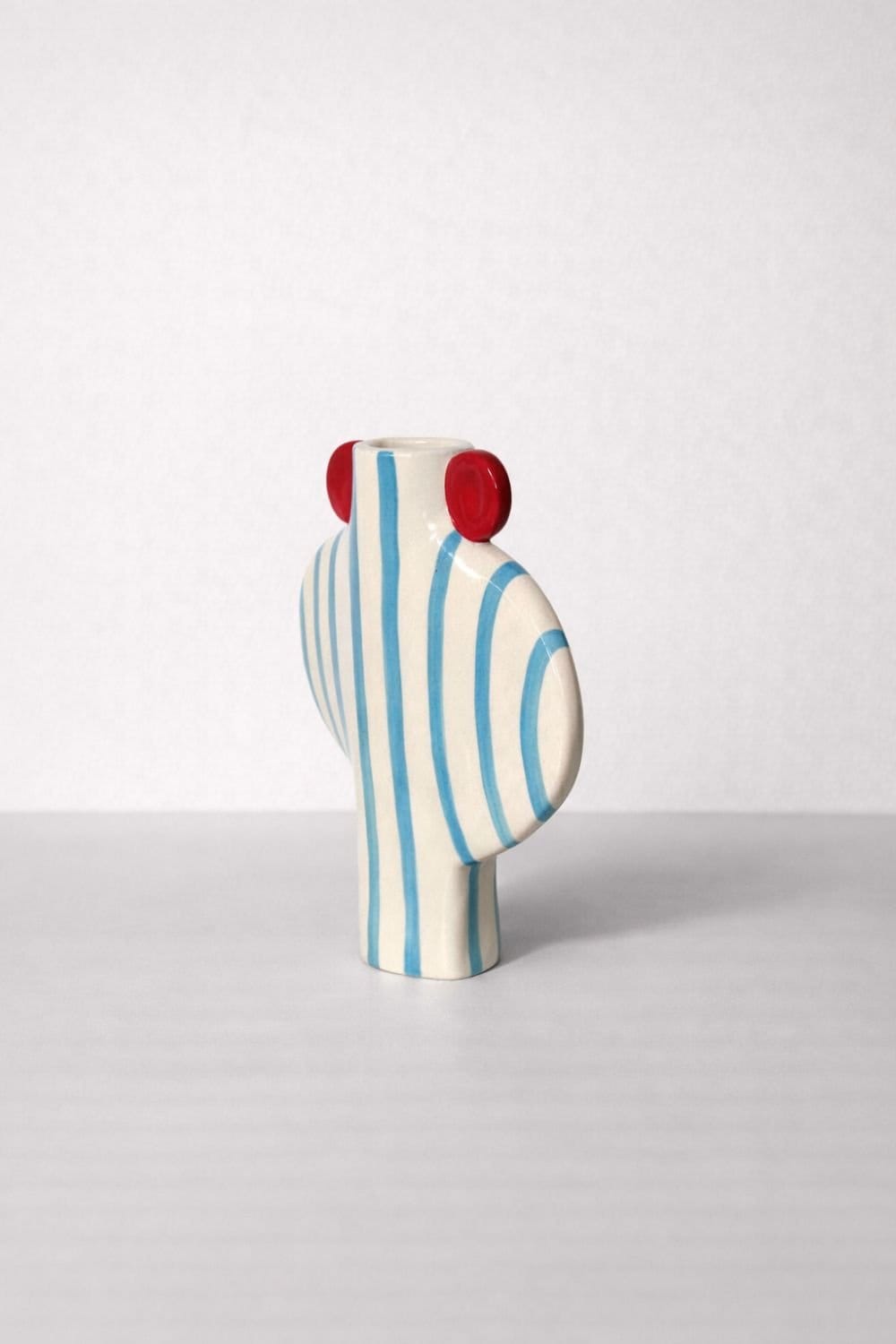 Blue Striped Vessel With Red Handles
