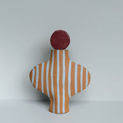 Blue Striped Terracotta Vessel With A Burgundy Stopper